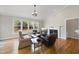 Inviting living room boasts hardwood floors, a fireplace, and an abundance of natural light at 500 Skygrove Dr, Holly Springs, NC 27540