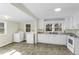 Modern laundry appliances and kitchen area at 510 Short W St, Hillsborough, NC 27278