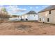 Exterior view of home featuring backyard space, fence, and potential for outdoor living and activities at 538 E Waycliff Rd, Henderson, NC 27537
