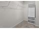 Walk-in closet featuring wire shelving and carpeted floor at 538 E Waycliff Rd, Henderson, NC 27537
