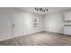 Flex room with a door to outside, recessed lighting, and tile-look flooring at 538 E Waycliff Rd, Henderson, NC 27537
