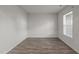 Spacious living room with luxury vinyl plank flooring and a large window at 538 E Waycliff Rd, Henderson, NC 27537