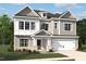 Charming new two-story home with a spacious two-car garage and beautifully landscaped front yard at 540 Jocund St # 17, Rolesville, NC 27571