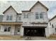 Exterior of a new two-story home under construction with visible framing and windows at 544 Jocund St # 16, Rolesville, NC 27571