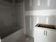 Bathroom showcasing a shower-tub and a vanity at 548 Jocund St # 15, Rolesville, NC 27571