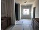 A spacious bathroom is partially completed, ready for finishing at 548 Jocund St # 15, Rolesville, NC 27571