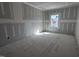 Spacious bedroom with a window and bare floors at 548 Jocund St # 15, Rolesville, NC 27571