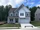 Beautiful two-story home with a well-maintained lawn and inviting front porch at 548 Jocund St # 15, Rolesville, NC 27571