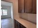 Partial kitchen view leading into the dining room, highlighting counter space and cabinetry at 548 Jocund St # 15, Rolesville, NC 27571