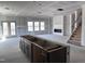 Spacious living area with large windows, fireplace, and open access to upper level at 548 Jocund St # 15, Rolesville, NC 27571