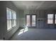 Living area with windows, a door to an outdoor porch, and natural light at 548 Jocund St # 15, Rolesville, NC 27571