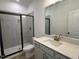 Sleek bathroom featuring a modern vanity, tiled walk-in shower, and stylish fixtures at 564 Jocund St # 11, Rolesville, NC 27571
