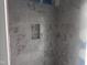 New bathroom shower featuring gray tile at 564 Jocund St # 11, Rolesville, NC 27571