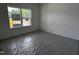 Sunny bedroom with a large window offering green outdoor views, creating a tranquil and airy atmosphere at 564 Jocund St # 11, Rolesville, NC 27571
