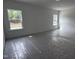 Bright, spacious bedroom with natural light streaming through two large windows, creating an inviting space at 564 Jocund St # 11, Rolesville, NC 27571