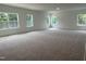 Expansive bonus room with neutral carpet and multiple windows for natural light at 564 Jocund St # 11, Rolesville, NC 27571