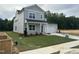 Beautiful two-story home with a two-car garage, set on a well-maintained lawn at 564 Jocund St # 11, Rolesville, NC 27571