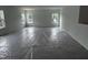 Spacious living room with multiple windows allowing ample natural light at 564 Jocund St # 11, Rolesville, NC 27571