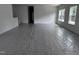 Bright living room featuring large windows and neutral walls at 564 Jocund St # 11, Rolesville, NC 27571
