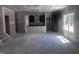 Large, unfinished living area showcasing dark cabinets and an open-concept design at 564 Jocund St # 11, Rolesville, NC 27571