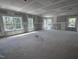 Large empty room with multiple windows at 564 Jocund St # 11, Rolesville, NC 27571