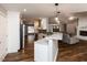 Modern kitchen featuring white cabinets and stainless steel appliances at 5715 Sky Lane Dr, Durham, NC 27704