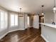 Eat-in kitchen with breakfast bar and lots of natural light at 5715 Sky Lane Dr, Durham, NC 27704