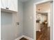 View into the living area from the laundry room featuring hardwood flooring at 5715 Sky Lane Dr, Durham, NC 27704