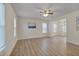 Spacious living room with neutral walls, lots of natural light, and a ceiling fan at 700 Grandview Dr, Durham, NC 27703