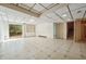 Spacious basement with built-in shelves and sliding glass door at 706 Collington Dr, Cary, NC 27511