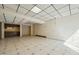 Basement rec room with bar area and tile flooring at 706 Collington Dr, Cary, NC 27511