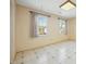 Bright bedroom featuring two windows letting in natural light at 706 Collington Dr, Cary, NC 27511