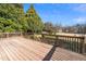 Expansive backyard with wooden deck perfect for gatherings and outdoor activities at 716 S Meadow Rd, Raleigh, NC 27603