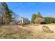 Backyard with a large lawn and utility shed at 716 S Meadow Rd, Raleigh, NC 27603