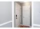 Light gray hallway with white doors and trim, showing the home's neutral color palette at 716 S Meadow Rd, Raleigh, NC 27603