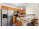 Beautiful kitchen with stainless steel appliances, granite countertops and wooden cabinetry at 723 Renshaw Ct, Cary, NC 27518