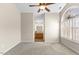 Light-filled main bedroom with carpet and an ensuite bathroom at 723 Renshaw Ct, Cary, NC 27518
