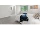 Bright bedroom with stylish decor and a large window offering natural light at 7317 Sandy Creek Dr, Raleigh, NC 27615