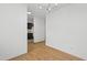 Bright living area with hardwood floors and modern chandelier at 7317 Sandy Creek Dr, Raleigh, NC 27615