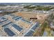 An aerial view shows the location of the townhomes in a community, near shopping centers at 7802 Flatrock Park Dr # 131, Knightdale, NC 27545