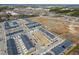 An aerial view shows a community of townhomes, with easy access to nearby shops, restaurants, and major roadways at 7802 Flatrock Park Dr # 131, Knightdale, NC 27545