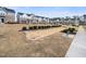 A community bocce ball court with seating provides a social and recreational space for residents at 7802 Flatrock Park Dr # 131, Knightdale, NC 27545