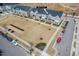 Exterior view of townhomes with a shared yard, showcasing modern design elements and convenient street parking at 7802 Flatrock Park Dr # 131, Knightdale, NC 27545