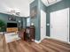 Comfortable living room with natural light and dark green accent wall at 7802 Flatrock Park Dr # 131, Knightdale, NC 27545