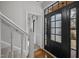 Bright foyer features a black front door with sidelights and a clear view to the dining area at 7904 Kingsland Dr, Raleigh, NC 27613