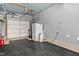 Well-lit garage space with ample storage and a clean, organized layout perfect for vehicle parking at 809 Handel Ln, Apex, NC 27502