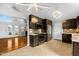 Open concept kitchen with stainless appliances, sleek cabinetry, and modern lighting at 809 Handel Ln, Apex, NC 27502