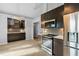 Elegant kitchen showcases stainless steel appliances and stylish cabinetry at 809 Handel Ln, Apex, NC 27502