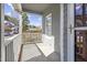 Inviting covered front porch, perfect for relaxing and enjoying the neighborhood views at 8310 Hempshire Pl # 106, Raleigh, NC 27613