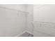 Walk-in closet with carpet and wire shelving at 8310 Hempshire Pl # 106, Raleigh, NC 27613